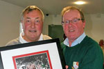Stephen Laverick recieving a signed limited edition print of Charlie Hurley, Len Ashurst & Monty