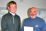 Phil Smith of Town Centre Citroen presenting winner of longest drive on 17th - Jack Richardson